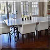 F05. Antique marble top table on wrought iron base. 31”h x 96”w x 48”d 